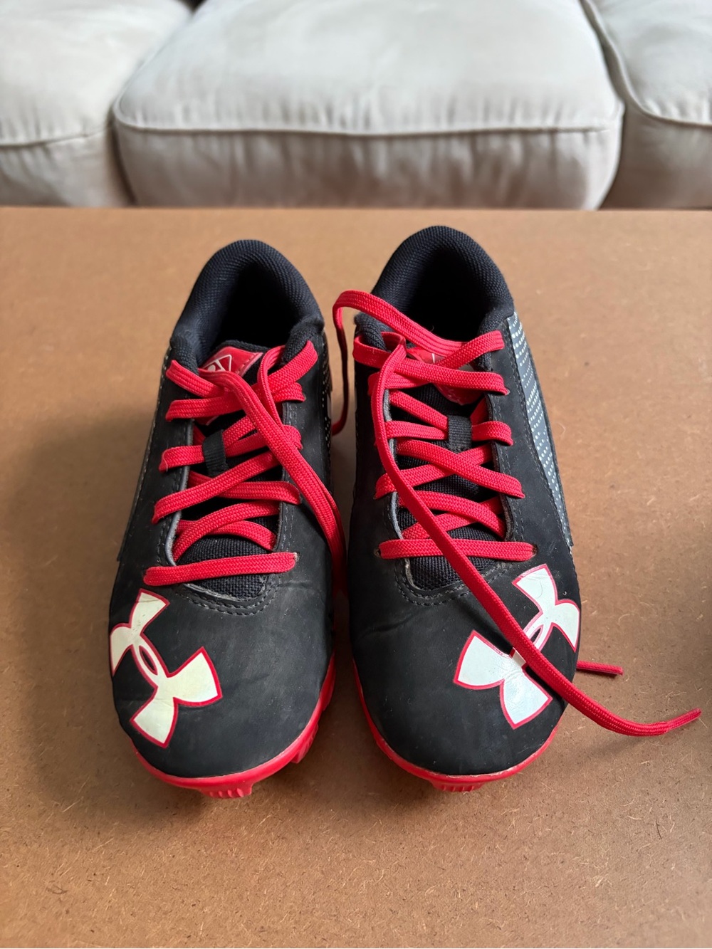 Under Armour Black and Red Kids' Soccer Cleats